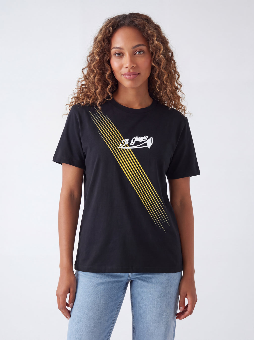 Female model wearing Il Ghigno Drop 0 black organic cotton t-shirt with Gold Sun print